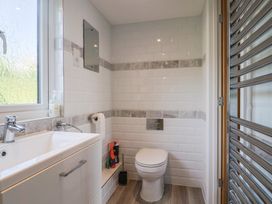 A bathroom with a sink and toilet at Seaview in Lyme Regis