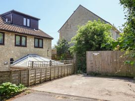 An outdoor area with a parking space and nearby houses at Seaview in Lyme Regis