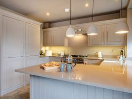 A kitchen with counters and appliances at Prospect House in Windermere