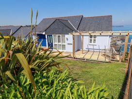 A house with a garden and a deck at Trewollock in Mevagissey
