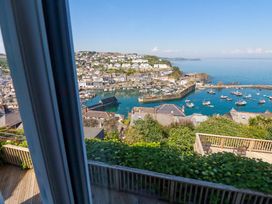 A view of the harbor and houses at Trewollock in Mevagissey
