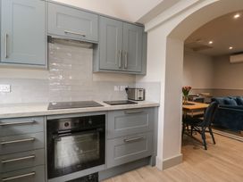 A kitchen with cabinets and appliances at Foxglove in Stratton Audley near Bicester