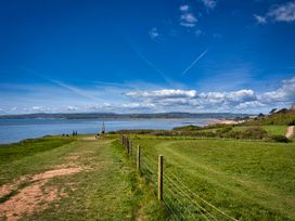 A landscape view of grass and ocean at Halsdon Avenue in Exmouth