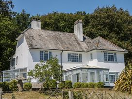 A house with windows and a garden at The White House in Okehampton