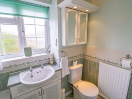 A bathroom with a sink and toilet at Number 10, Broadway