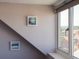 A corner of an attic with two pictures on the wall at 4 Studley Terrace in Whitby