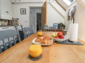 A kitchen with a table set for breakfast at 15D Foss Street Dartmouth