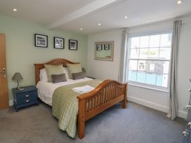 A bedroom with a bed and window at 15D Foss Street Dartmouth