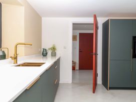 A kitchen with a sink and countertop at Reddaway Byre Okehampton