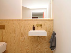 A bathroom with a sink and towel at Reddaway Byre Okehampton