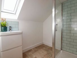 A bathroom with a sink and shower at The Granary in Launceston