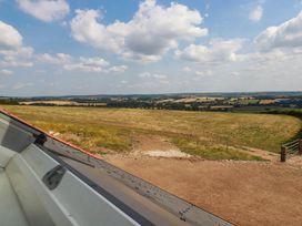 A view of a field and sky from a roof at The Granary in Launceston