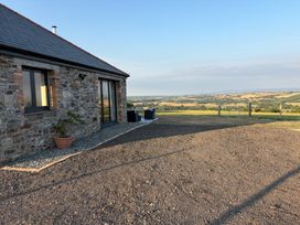 An outdoor area with stone wall and gravel at Up Top in Launceston