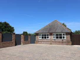 A house with windows and gates at Frome View in Wool