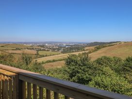 A scenic view of hills and a city in the distance at Lodge 19 Millbrook