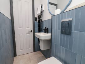 A bathroom with a sink and toilet at Apartment Blue in Whitby