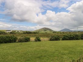 A landscape view with hills and houses at Islands Inn Louisburgh, County Mayo