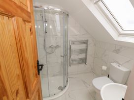 A bathroom with shower and toilet at Islands Inn in Louisburgh, County Mayo