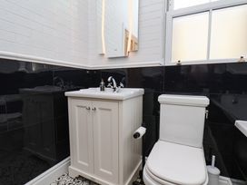 A bathroom with a sink and toilet at Sea View Apartment in Whitby