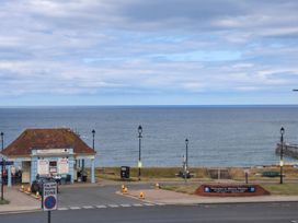 An outdoor view of the sea and Whitby Pavilion at Sea View Apartment in Whitby