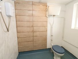 A bathroom with a toilet and a shower at The Watch House in Weymouth