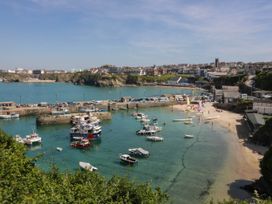 A harbor with boats and beach at Studio Room No.2 in Newquay