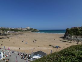 A beach with people and ocean at Studio Room No.2 in Newquay