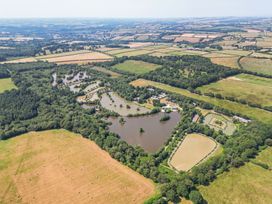 An aerial view of ponds and fields at Rod and Rest in Dolton