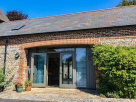 An entrance with double doors and window at Frome Gazey in Frampton