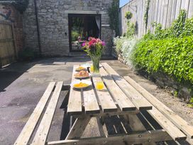 An outdoor area with a table set for breakfast at Owl in Pickering