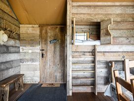 A bedroom with a bunk bed and wooden furniture at Luxury Safari Lodge Sleeps 4/6 Deer Park Dogs Ok Zeal Monachorum near Bow