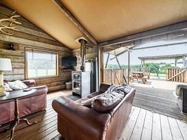 A living room with a couch and table at Luxury Safari Lodge Sleeps 4/6 Deer Park Dogs Ok Zeal Monachorum near Bow