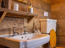 A bathroom with a sink and toilet at 