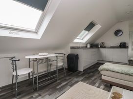 A kitchen area with dining table and chairs at Fields view Bridlington