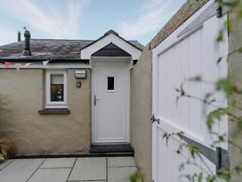 An entrance with a white door and window at TyCosy in St Davids