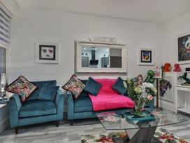 A living room with a couch and coffee table at 1 Bed Flat - Sleeps 2 - Parking - Wifi, Scarborough