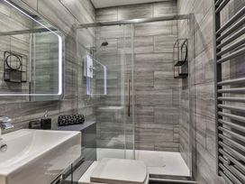 A bathroom with a sink, toilet, and shower at 1 Bed Flat - Sleeps 2 - Parking - Wifi in Scarborough
