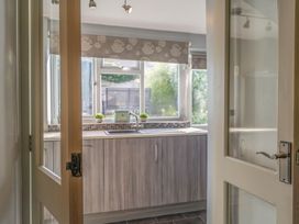 A kitchen with a countertop and sink visible at Cosy cottage near scenic walks and country pub in Penrith