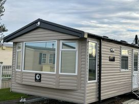 A caravan exterior view at R&R Coastal Retreats Cedars 63 in Skegness