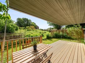 An outdoor space with a table and chairs in St. Dogmaels near Cardigan
