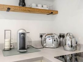 A kitchen with coffee maker and kettle at Luxury 2 bedroom Lodge in rural lincolnshire