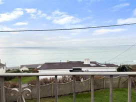 A view of the sea from a property balcony at Porthleven Coastal Retreat with 5 Bedrooms Porthleven