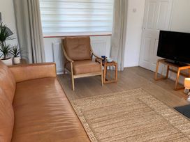 A living room with a sofa and armchair at 2 Bed Sleeps 4 Parking Pets 10 min walk to Beach Falmouth