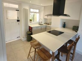 A kitchen with counter and appliances at Looe Cottage Seaside views log fire sleeps 4 in Looe