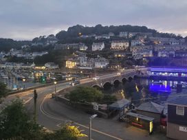 A view of a bridge and boats at Looe Cottage Seaside views log fire sleeps 4 in Looe