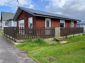 A house with a wooden fence and pathway at a property in Bridlington