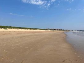 A beach with sand and water at the coast in Bridlington