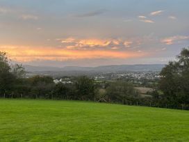 A landscape view with grass and hills at a property in Newton Abbot