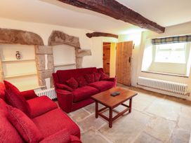 A living room with a sofa and coffee table at Claybottom Farm near Hesket Newmarket