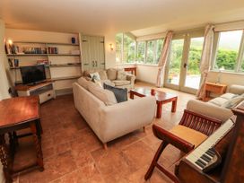 A living room with a sofa and coffee table at Claybottom Farm near Hesket Newmarket